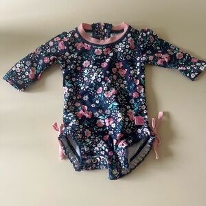 RuffleButts Baby Girl Long Sleeve One Piece Rashguard - Moonlit Meadow 0-3M